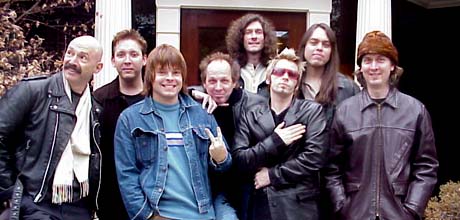 Musicians and engineers at studio