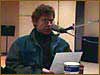 Bill reads on-air copy at WDET